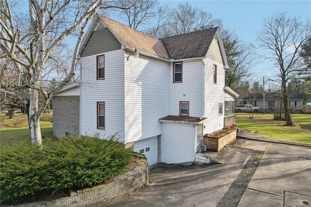 4553 Marr Rd, Pulaski Twp Law, PA 16143 - view of property exterior with a garage, concrete driveway, and a shingled roof