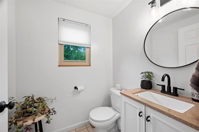 113 Stoney Creek Ct, Seven Fields Boro, PA 16046 - bathroom with toilet, vanity, tile patterned floors, and baseboards