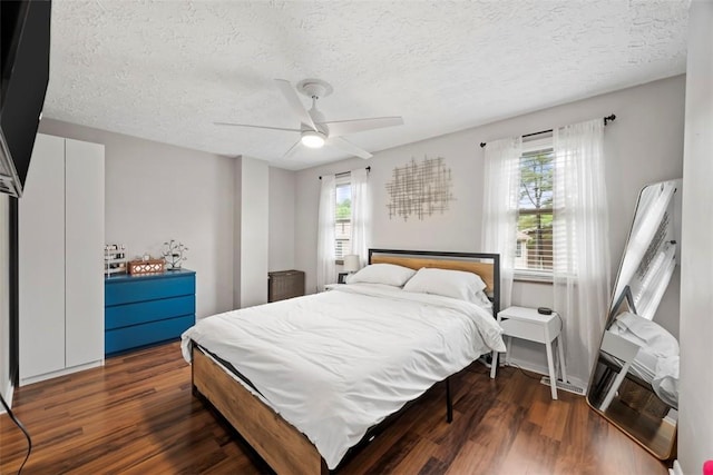 113 Stoney Creek Ct, Seven Fields Boro, PA 16046 - bedroom featuring wood finished floors, a textured ceiling, and a ceiling fan