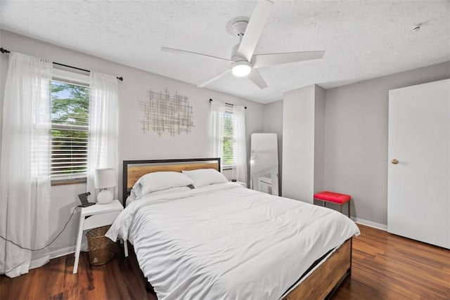113 Stoney Creek Ct, Seven Fields Boro, PA 16046 - bedroom with wood finished floors, ceiling fan, baseboards, and a textured ceiling
