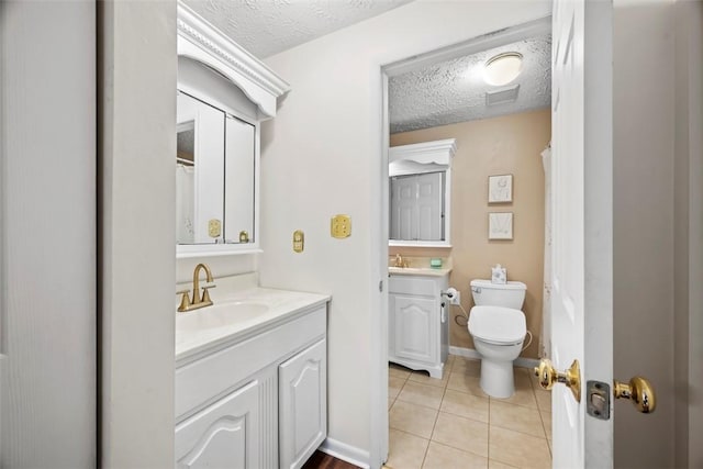 113 Stoney Creek Ct, Seven Fields Boro, PA 16046 - bathroom featuring vanity, a textured ceiling, tile patterned floors, toilet, and a shower with curtain