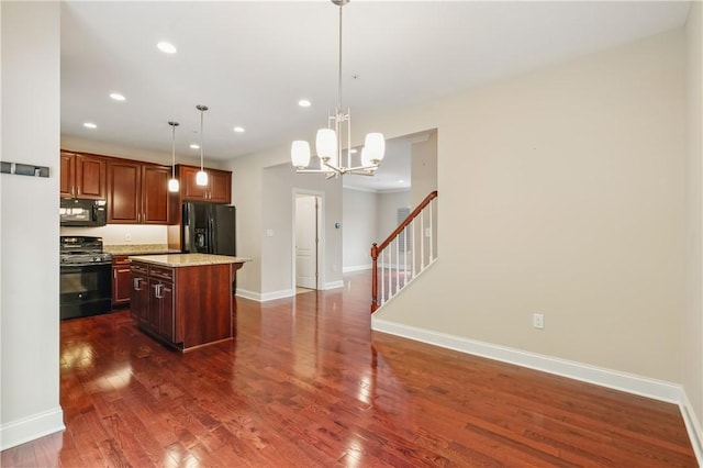 135 Lenox Dr, Findlay Twp, PA 15126 - kitchen with black appliances, a kitchen island, a chandelier, recessed lighting, and baseboards