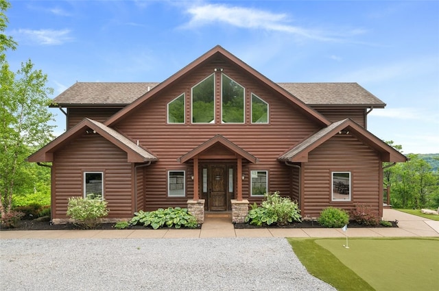 201 Roosevelt Rd, Kilbuck Twp, PA 15202 - view of front of home featuring an area to practice putting, roof with shingles, and faux log siding
