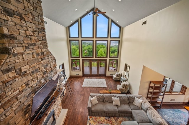 201 Roosevelt Rd, Kilbuck Twp, PA 15202 - living area featuring high vaulted ceiling, a stone fireplace, dark wood finished floors, a ceiling fan, and baseboards