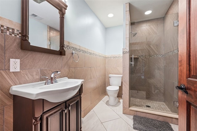 201 Roosevelt Rd, Kilbuck Twp, PA 15202 - full bathroom featuring toilet, a shower stall, tile walls, vanity, and a wainscoted wall