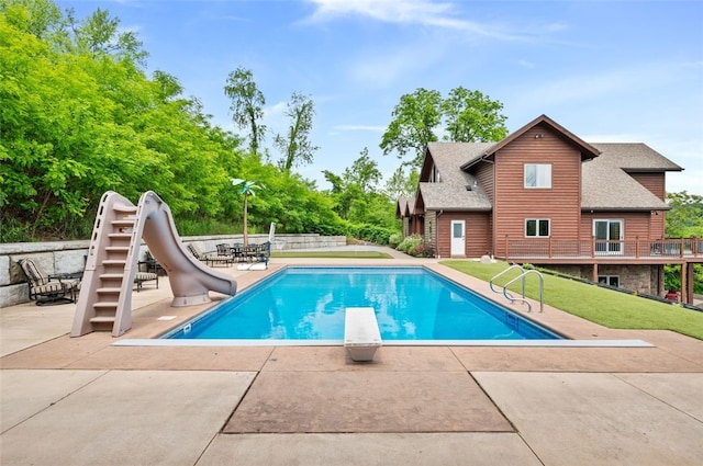 201 Roosevelt Rd, Kilbuck Twp, PA 15202 - view of pool with a water slide, a patio, a diving board, and a yard
