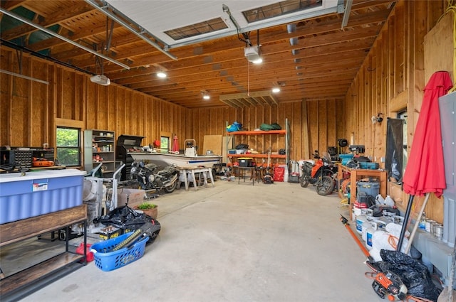 201 Roosevelt Rd, Kilbuck Twp, PA 15202 - garage with a workshop area and a garage door opener
