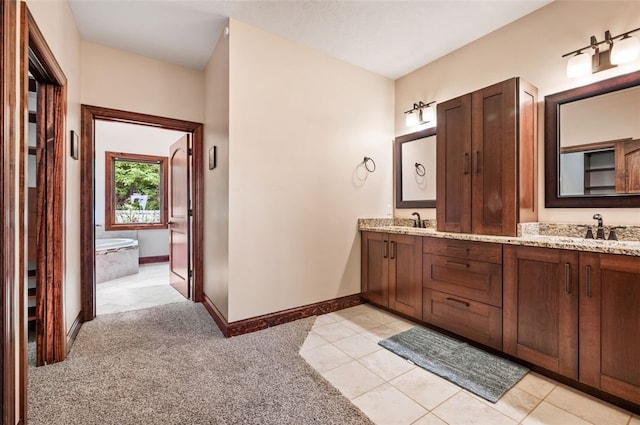 201 Roosevelt Rd, Kilbuck Twp, PA 15202 - bathroom with double vanity, tile patterned floors, baseboards, and a bathtub