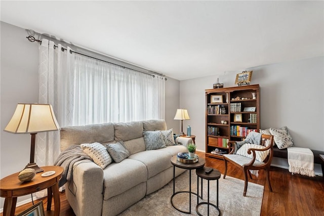 724 Pine Valley Dr, Plum Boro, PA 15239 - living room featuring wood finished floors and baseboards