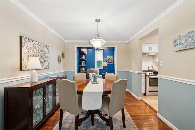 724 Pine Valley Dr, Plum Boro, PA 15239 - dining area with wood finished floors and crown molding