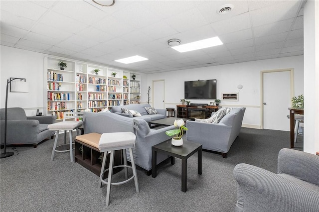 5 Bayard Rd Unit 808, Shadyside, PA 15213 - living room with carpet flooring, a drop ceiling, and built in shelves