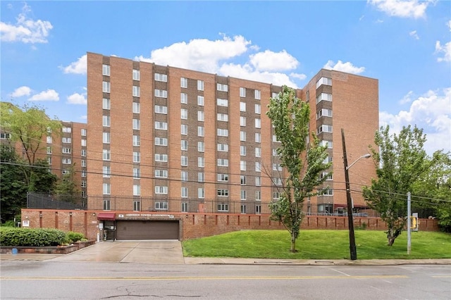 5 Bayard Rd Unit 808, Shadyside, PA 15213 - view of apartment building / complex featuring concrete driveway and a garage