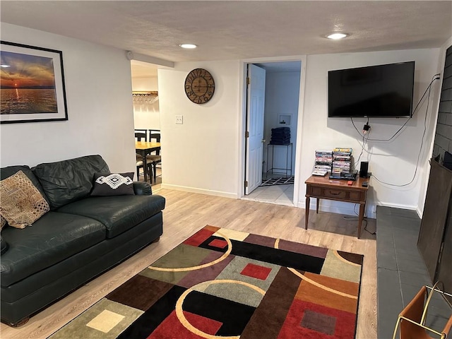 2057 Mccann Dr, Shenango, PA 16424 - living room with wood finished floors, baseboards, and recessed lighting