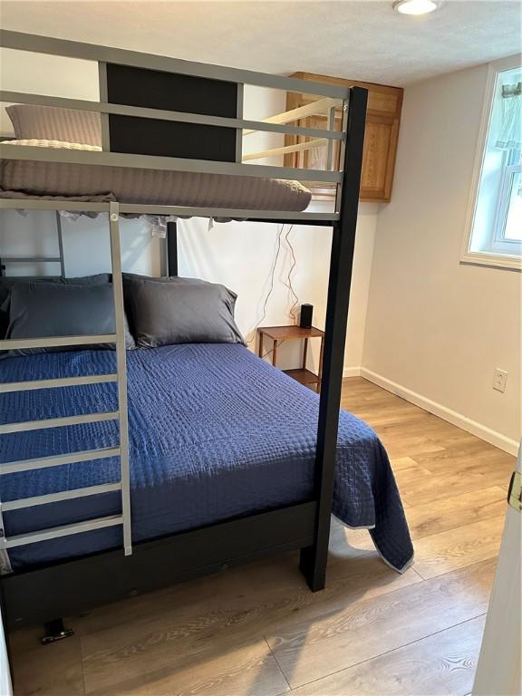 2057 Mccann Dr, Shenango, PA 16424 - bedroom featuring light wood finished floors and baseboards