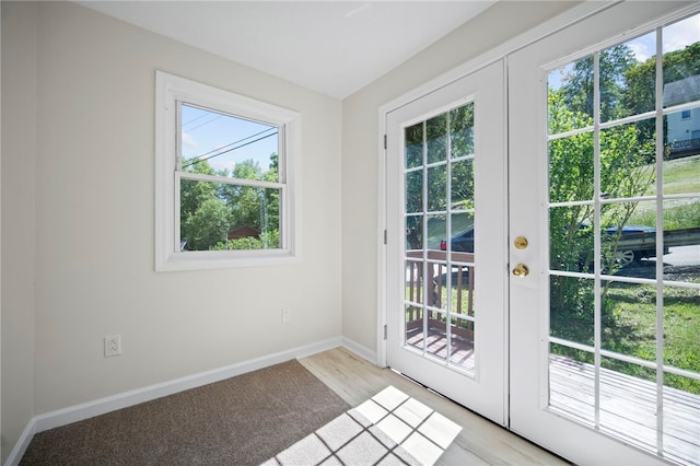 470 Burrell Hill Cir, Penn Twp Wml, PA 15675 - doorway to outside featuring baseboards and light colored carpet