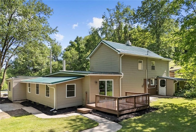 470 Burrell Hill Cir, Penn Twp Wml, PA 15675 - back of property featuring a yard, a wooden deck, metal roof, and view of scattered trees