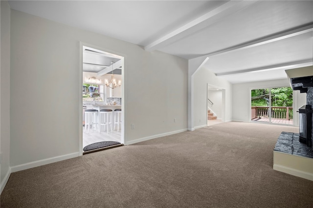 470 Burrell Hill Cir, Penn Twp Wml, PA 15675 - unfurnished living room featuring a chandelier, stairs, beamed ceiling, carpet flooring, and baseboards