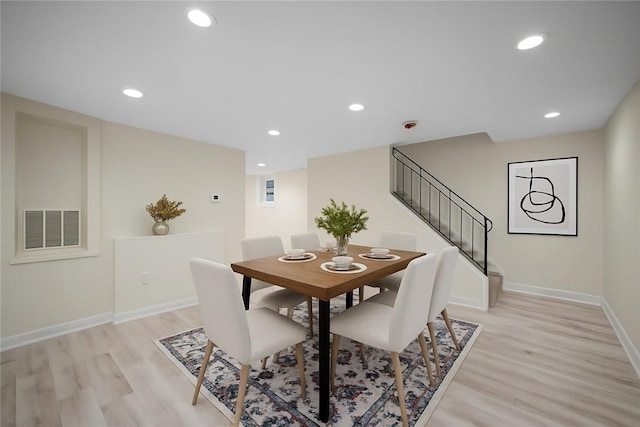 470 Burrell Hill Cir, Penn Twp Wml, PA 15675 - dining area featuring light wood finished floors, stairs, baseboards, and recessed lighting