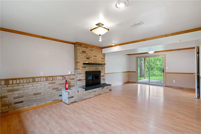 116 Buttercup Dr, Cranberry Twp, PA 16066 - unfurnished living room featuring ornamental molding, wood finished floors, baseboards, and a fireplace