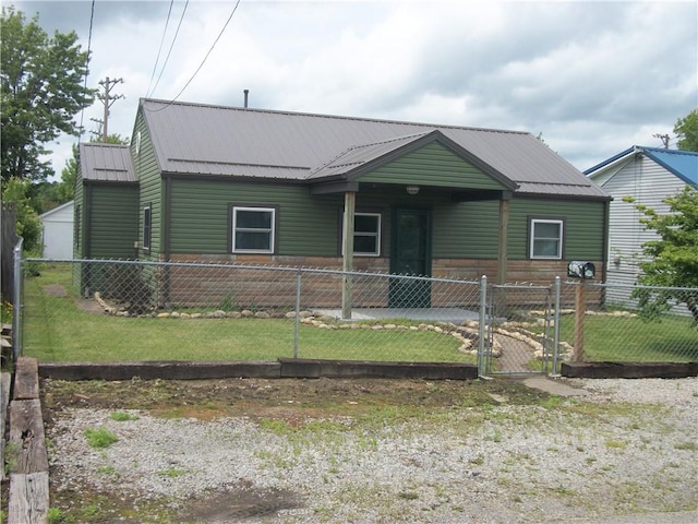 13 Biddle Acres, Carmichaels/Cumblnd, PA 15320 - view of front facade with metal roof and a gate