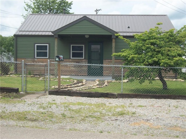 13 Biddle Acres, Carmichaels/Cumblnd, PA 15320 - view of front of house featuring a gate, a fenced front yard, metal roof, and a standing seam roof