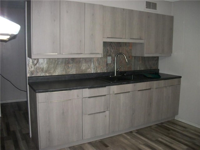 13 Biddle Acres, Carmichaels/Cumblnd, PA 15320 - kitchen featuring dark countertops, a sink, dark wood finished floors, and modern cabinets