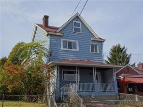 1800 Concordia St, Carrick, PA 15210 - view of front of house featuring a chimney and covered porch