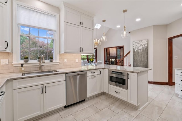 5010 W Grove Ln, Pine Twp Nal, PA 15044 - kitchen with appliances with stainless steel finishes, a sink, a peninsula, decorative backsplash, and recessed lighting