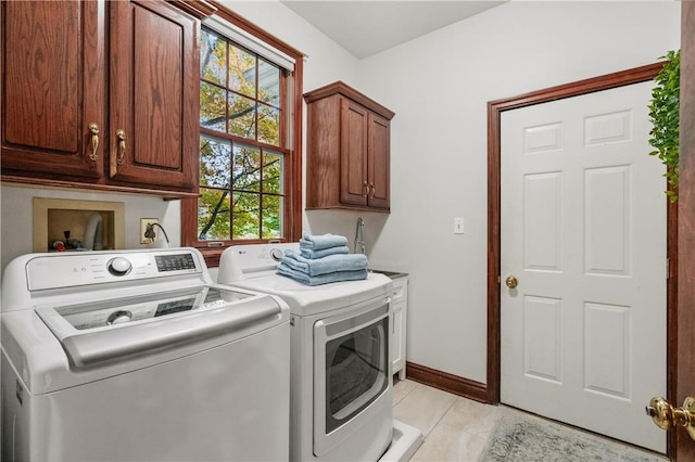 5010 W Grove Ln, Pine Twp Nal, PA 15044 - washroom featuring cabinet space, washer and clothes dryer, baseboards, and light tile patterned floors