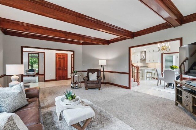 5010 W Grove Ln, Pine Twp Nal, PA 15044 - living area featuring a chandelier, beamed ceiling, light colored carpet, wainscoting, and stairway