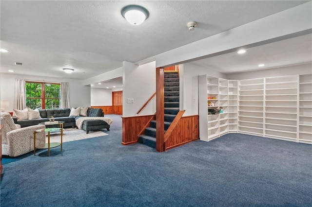 5010 W Grove Ln, Pine Twp Nal, PA 15044 - carpeted living area with a wainscoted wall, stairway, recessed lighting, and a textured ceiling