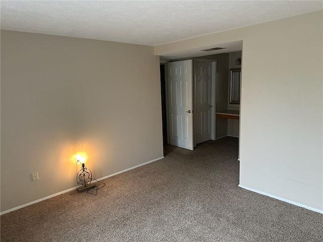 9015 James Ct Unit 9015, Hopewell Twp Bea, PA 15001 - spare room featuring carpet, baseboards, and a textured ceiling