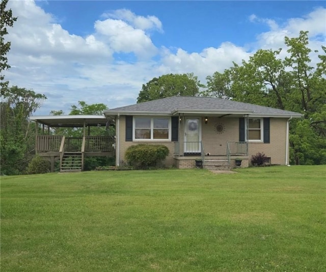 27 Elich Rd, Pa, PA 15021 - view of front of home featuring a front lawn, brick siding, and a porch