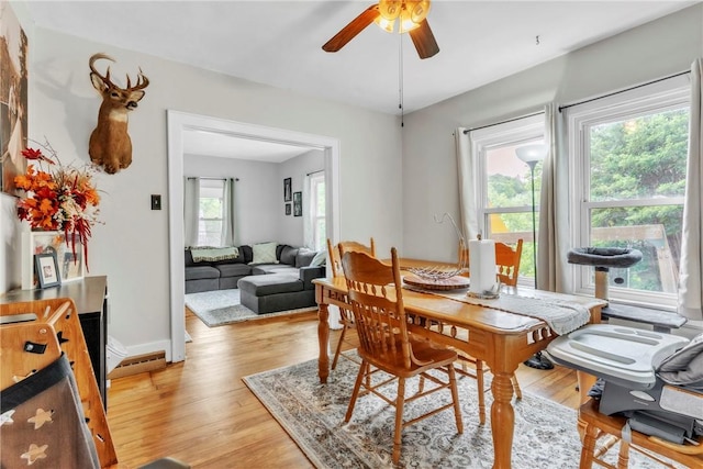 122 W Main St, Worthington, PA 16262 - dining area featuring healthy amount of natural light, ceiling fan, and light wood finished floors