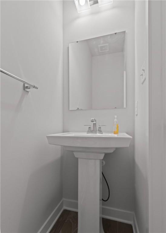 9002 Hickory Rd, Pine Twp Nal, PA 15044 - bathroom with baseboards and wood finished floors