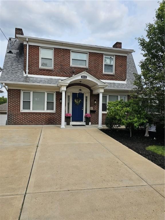 3213 Brownsville Rd, Brentwood, PA 15227 - view of front of property with a chimney and brick siding
