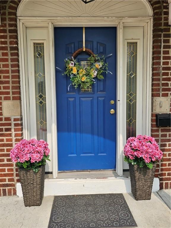 3213 Brownsville Rd, Brentwood, PA 15227 - view of exterior entry featuring brick siding