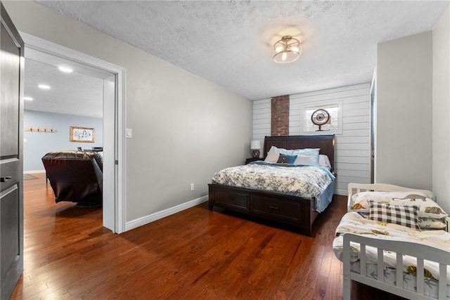 1904 E National Pike, North Bethlehem, PA 15360 - bedroom featuring dark wood-style floors, a textured ceiling, and baseboards