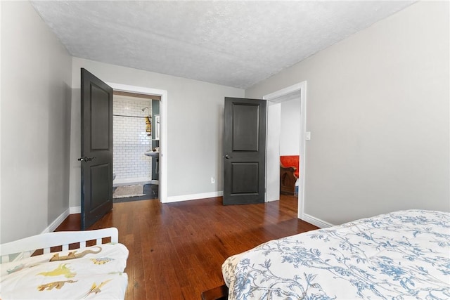 1904 E National Pike, North Bethlehem, PA 15360 - bedroom with wood finished floors, baseboards, and a textured ceiling
