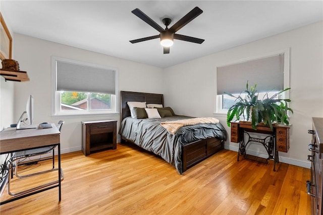 1904 E National Pike, North Bethlehem, PA 15360 - bedroom with light wood-type flooring, an office area, baseboards, and ceiling fan