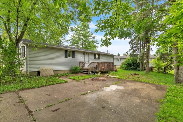 408 Mitchell Ave, City Of But Nw, PA 16001 - rear view of house featuring a patio and a deck