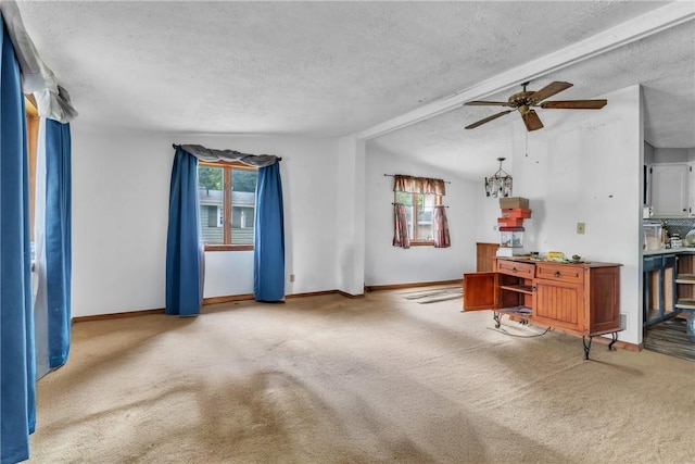 408 Mitchell Ave, City Of But Nw, PA 16001 - carpeted living room featuring a textured ceiling, ceiling fan, baseboards, and beam ceiling