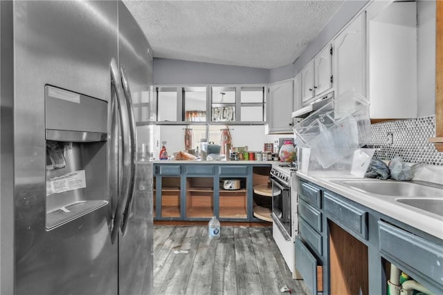 408 Mitchell Ave, City Of But Nw, PA 16001 - kitchen with stainless steel fridge with ice dispenser, a textured ceiling, light wood-style floors, white cabinetry, and light countertops