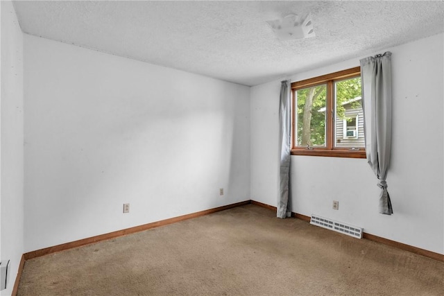 408 Mitchell Ave, City Of But Nw, PA 16001 - carpeted spare room with a textured ceiling and baseboards