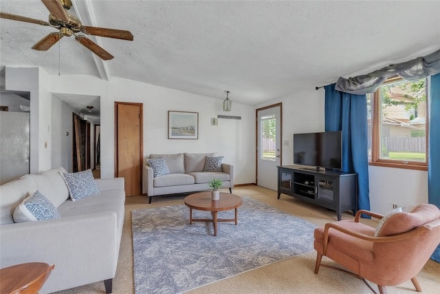 408 Mitchell Ave, City Of But Nw, PA 16001 - living area with a textured ceiling, vaulted ceiling, carpet floors, and a ceiling fan