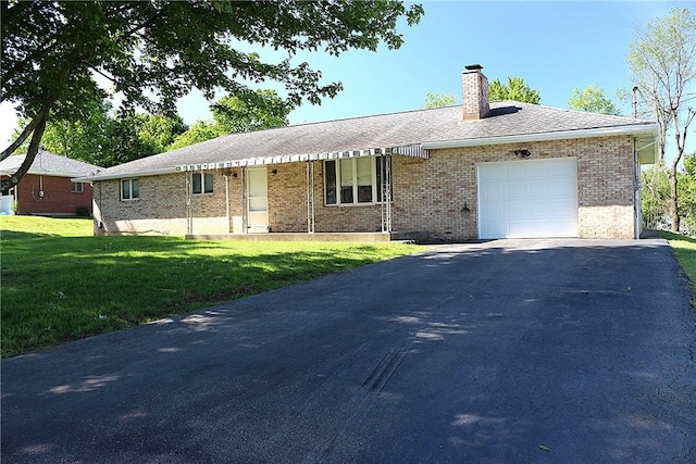 2224 Park Ave, Manor Twp, PA 16226 - single story home with a garage, brick siding, a chimney, a front lawn, and driveway