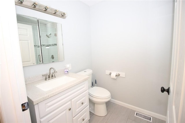 2224 Park Ave, Manor Twp, PA 16226 - full bath with vanity, a tile shower, toilet, and baseboards