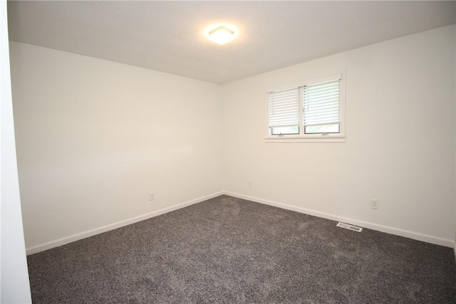 2224 Park Ave, Manor Twp, PA 16226 - empty room featuring dark carpet and baseboards
