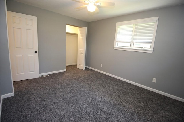 2224 Park Ave, Manor Twp, PA 16226 - unfurnished bedroom with dark colored carpet, baseboards, a closet, and a ceiling fan
