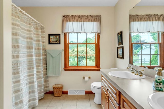 113 Sunburst Ct, Center Twp But, PA 16001 - bathroom with double vanity, toilet, tile patterned floors, and baseboards